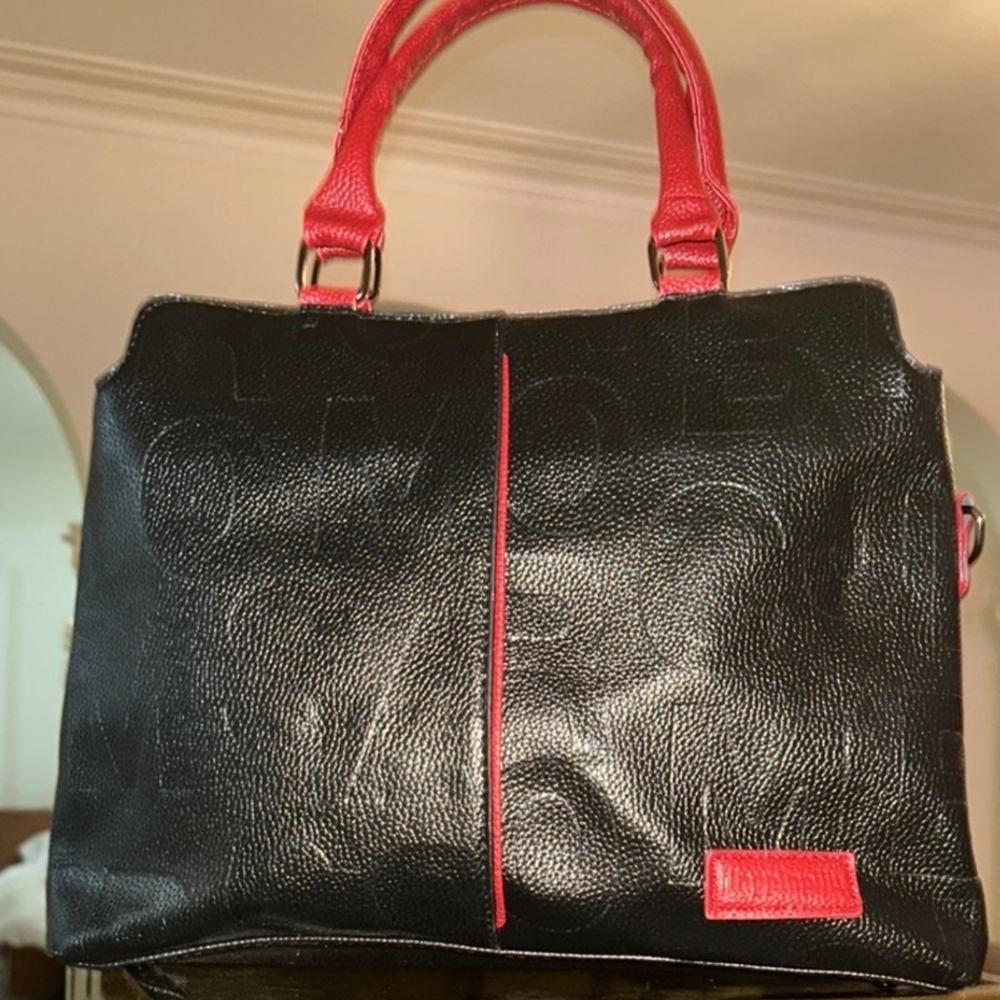 Black and Red Satchel with Textured Leather and Bold Accents